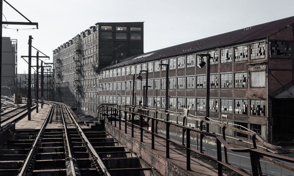 Industrial property beside railroad tracks, a setting where a boundary line survey can clarify property lines and rights of way