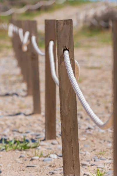Boundary survey property markers - ALTA SURVEY Tennessee Wooden stakes marking property boundaries during a boundary survey