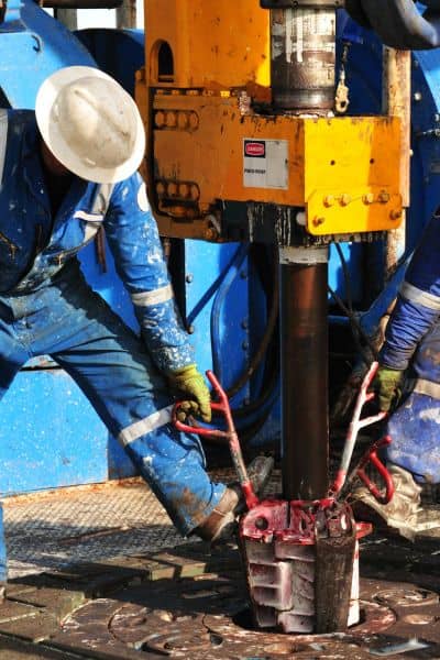 Geotechnical engineering soil drilling test - ALTA SURVEY Tennessee Engineers conducting soil drilling test to assess geotechnical stability during low river levels