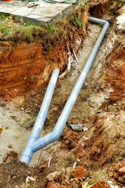 Underground drainage pipes installed as part of stormwater design to manage runoff and prevent flooding


