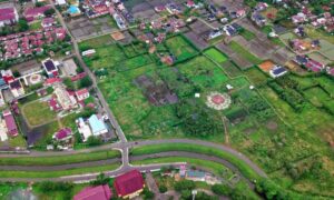 Aerial view of open land and road layout before subdivision engineering plans are finalized