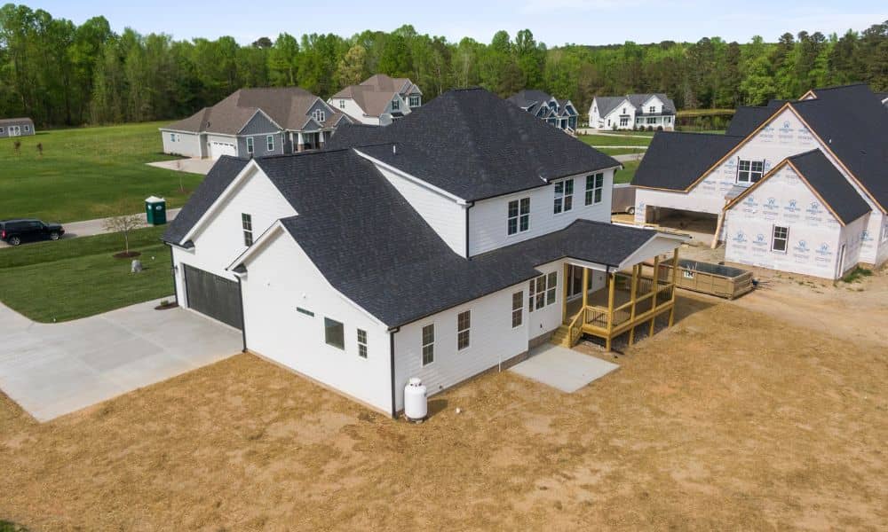 New homes under construction in a residential subdivision where a lot survey may be needed to confirm property boundaries