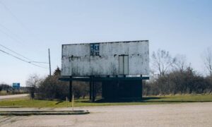 Roadside billboard on commercial property where an ALTA title survey may identify leased sign areas